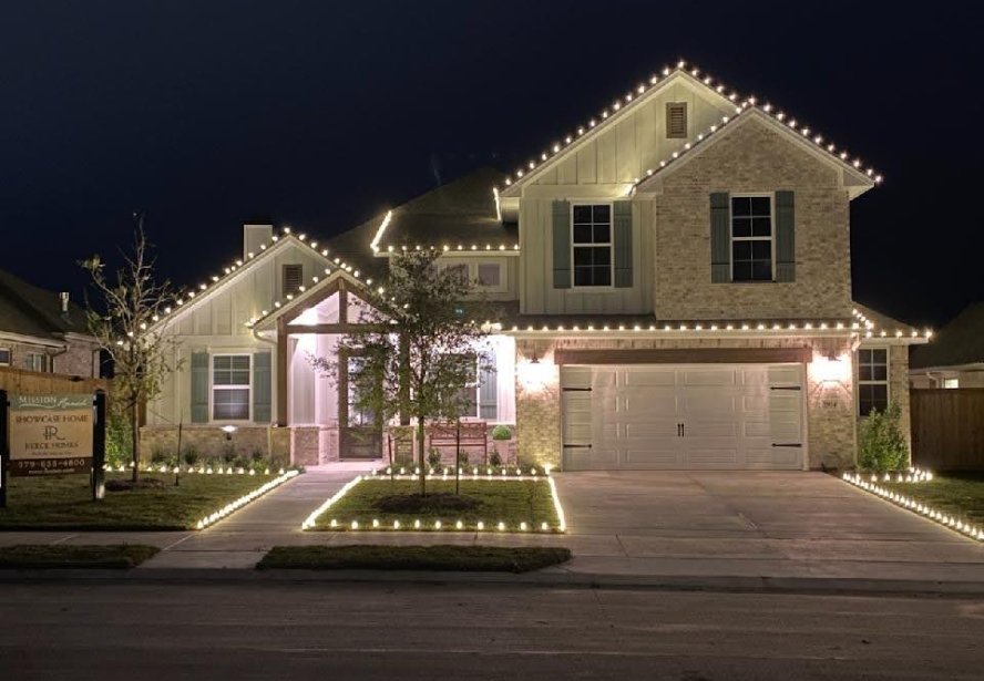Christmas lights along the roofline of a home in Hurricane, Utah